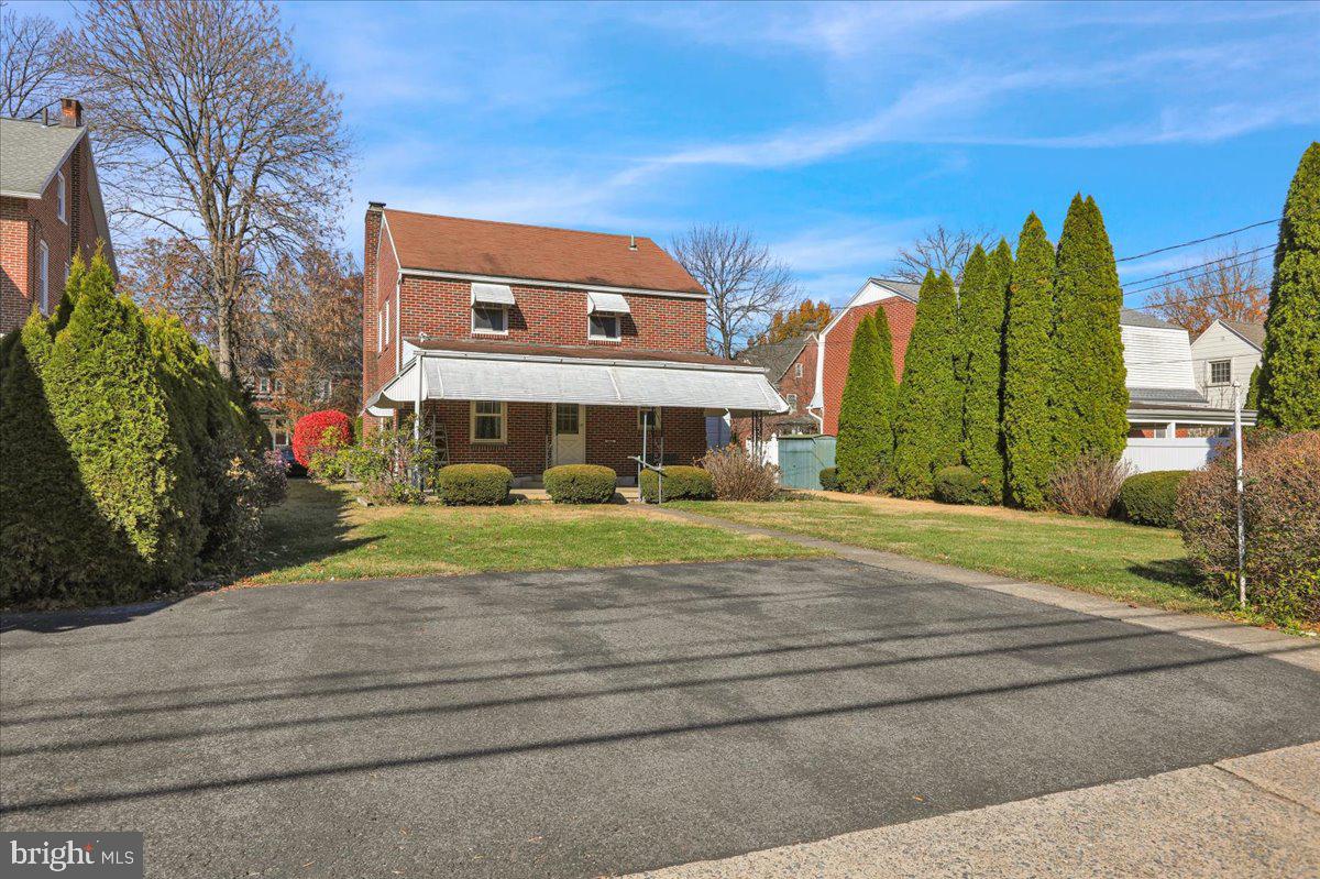 1510 Garfield Avenue Wyomissing, PA 19610 - Photo 24 of 26 a front view of a house with garden