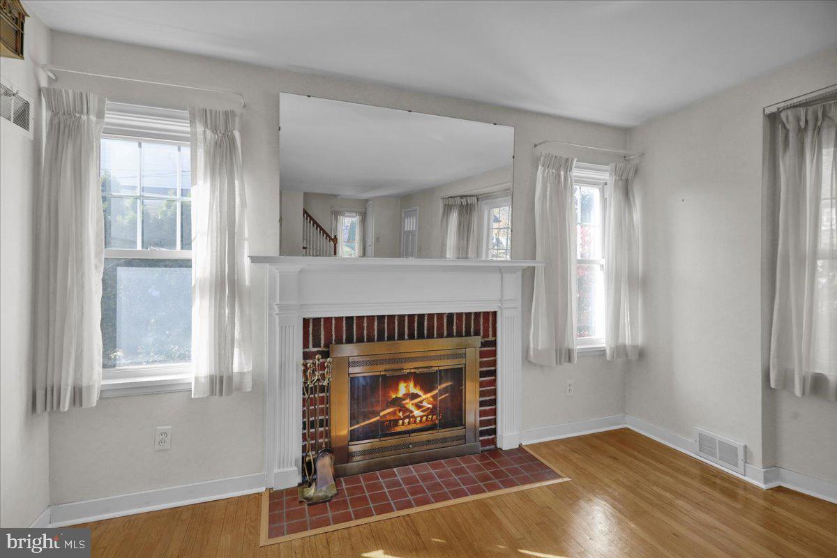 1510 Garfield Avenue Wyomissing, PA 19610 - Photo 3 of 26 a living room with furniture and a fireplace