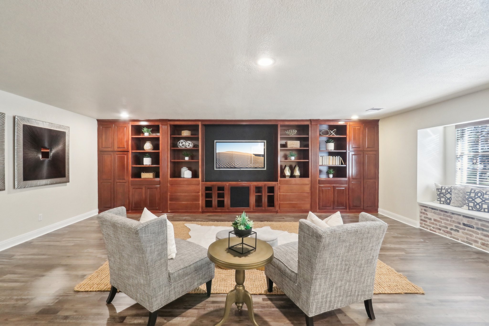 294 Logan Ranch Road Georgetown, TX 78628 - Photo 17 of 40 a living room with furniture and a wooden floor