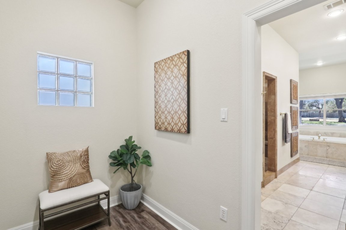 294 Logan Ranch Road Georgetown, TX 78628 - Photo 21 of 39 a living room with furniture and wooden floor