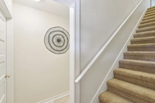 a bedroom with furniture and a chandelier