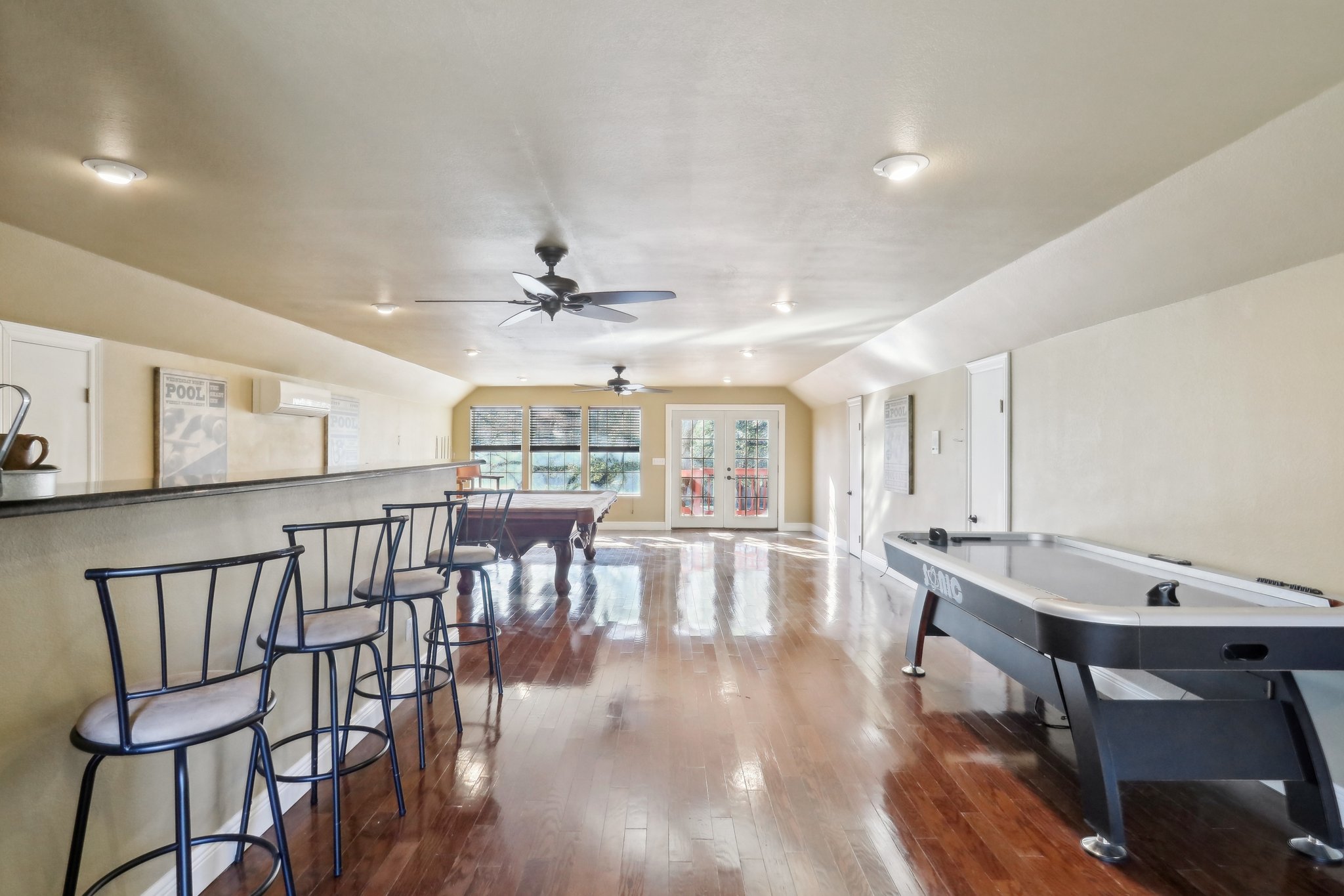 294 Logan Ranch Road Georgetown, TX 78628 - Photo 34 of 40 a view of a a dining room with furniture window and wooden floor