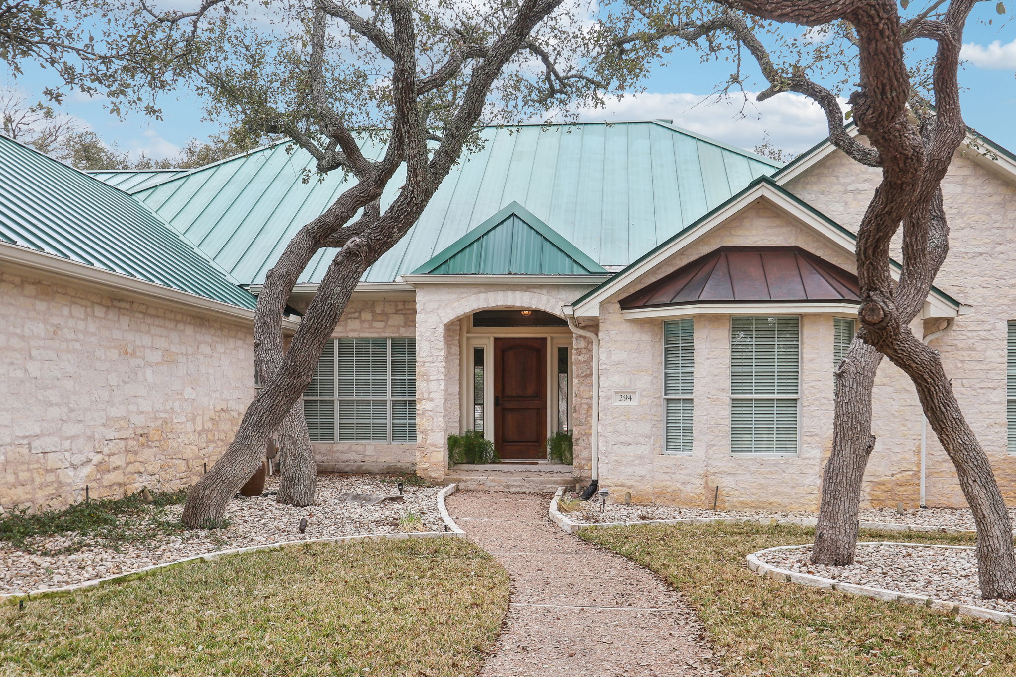 294 Logan Ranch Road Georgetown, TX 78628 - Photo 6 of 40 a house with trees in the background