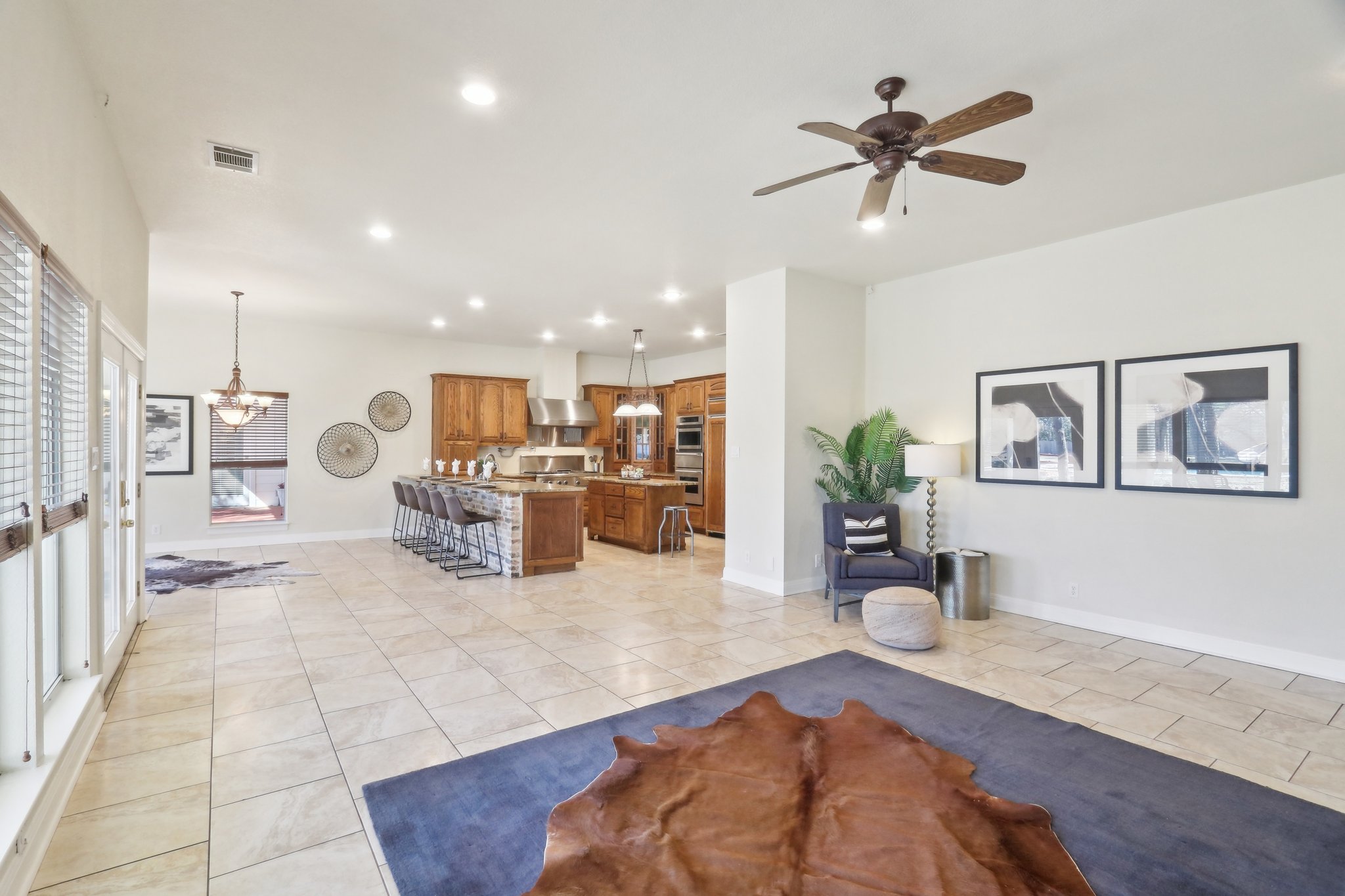 294 Logan Ranch Road Georgetown, TX 78628 - Photo 10 of 40 a living room with furniture and a view of kitchen