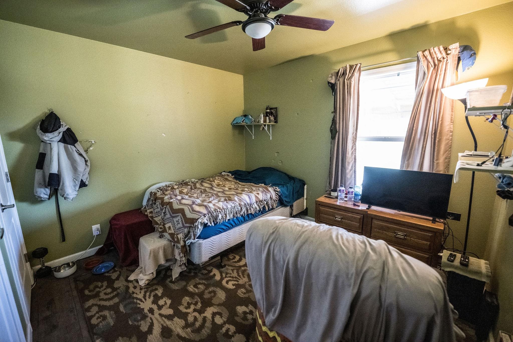 19958 Miller Canyon Ranch Road Glade Park, CO 81523 - Photo 18 of 42 a bedroom with two beds and a window