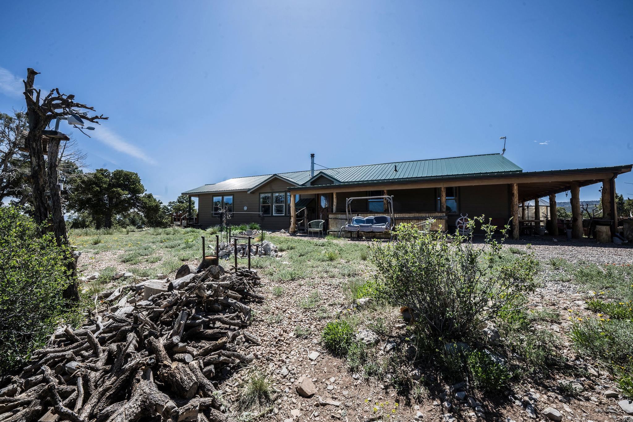19958 Miller Canyon Ranch Road Glade Park, CO 81523 - Photo 21 of 42 a front view of house with a yard