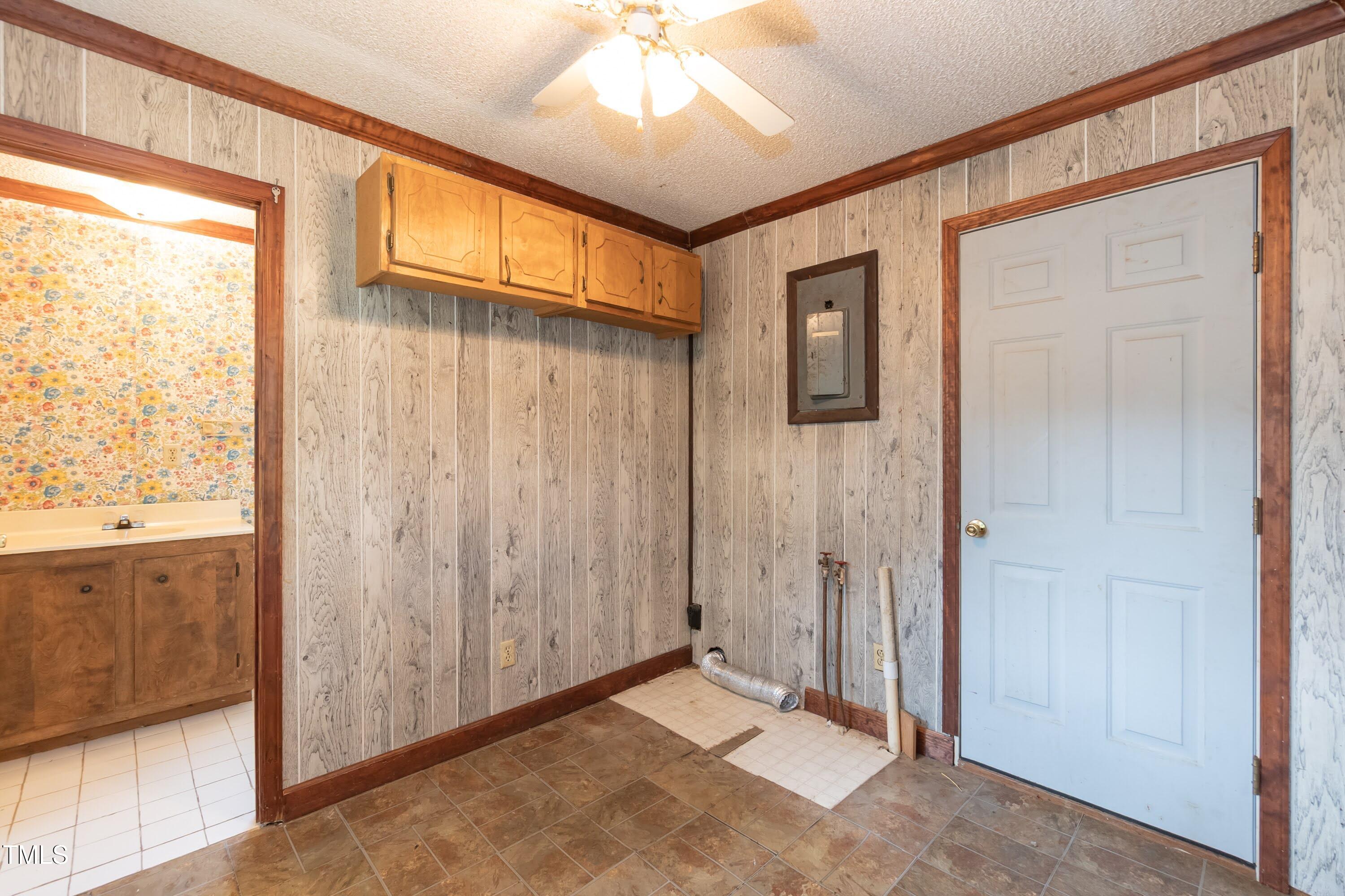 7828 Smith Road Apex, NC 27539 - Photo 12 of 21 Garage door opens into the laundry room.