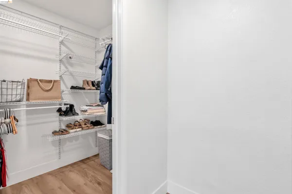 a kitchen with cabinets and white appliances