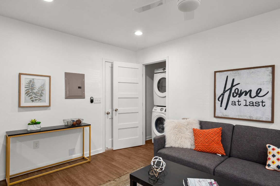 301 East 33rd Street, Unit 1 Austin, TX 78705 - Photo 6 of 9 a living room with furniture and wooden floor