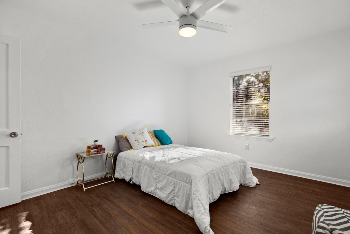 301 East 33rd Street, Unit 1 Austin, TX 78705 - Photo 7 of 9 a bedroom with a bed and a window