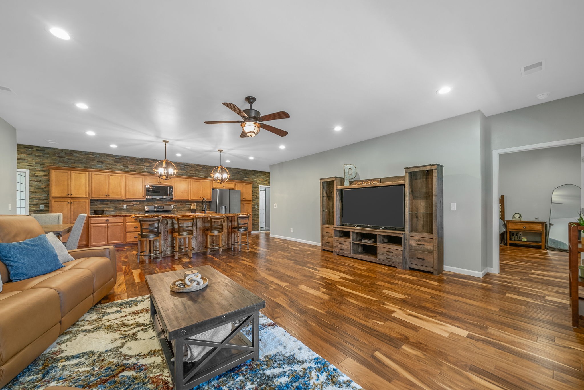950 Choate Road Dickson, TN 37055 - Photo 14 of 56 a living room with furniture and kitchen view