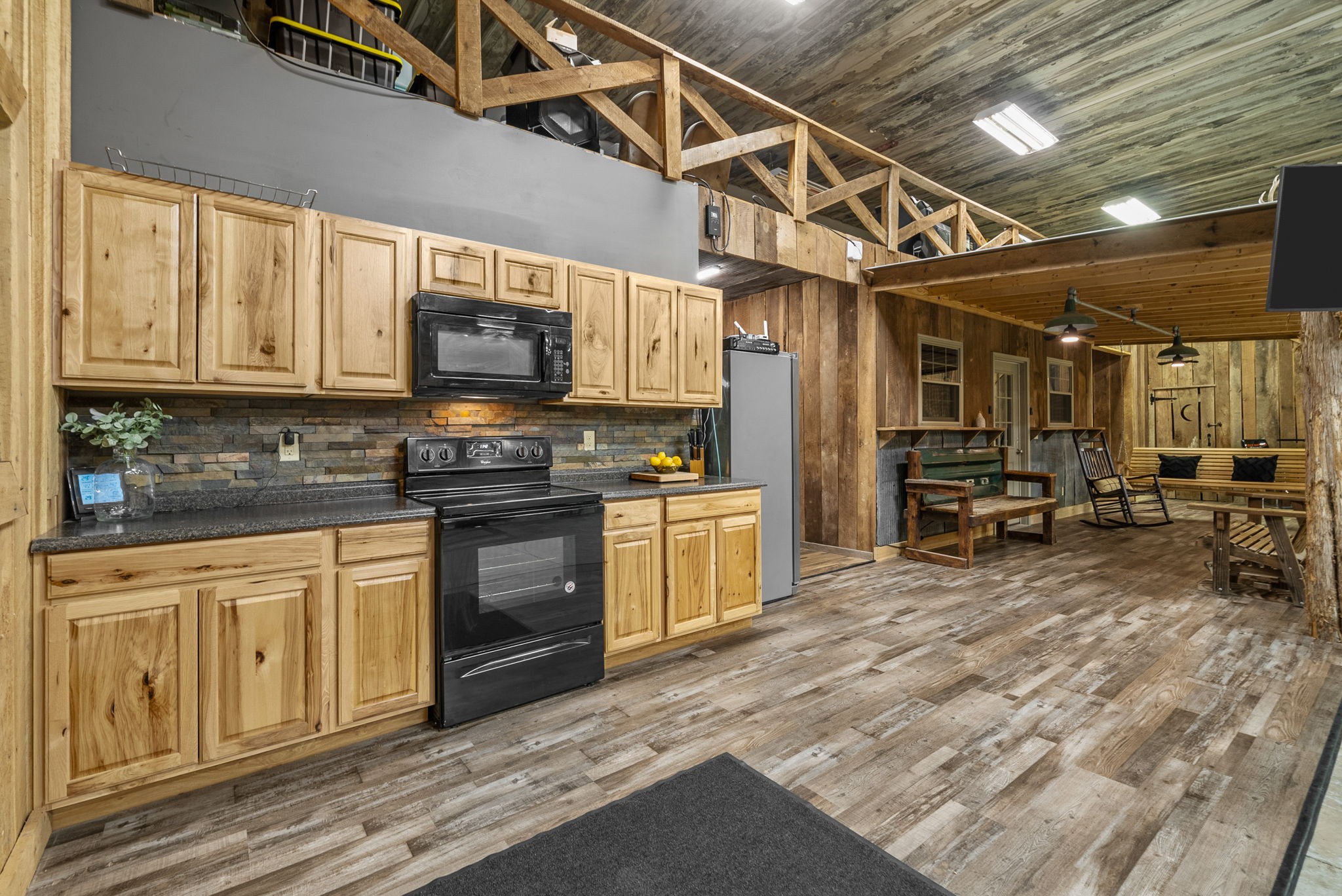 950 Choate Road Dickson, TN 37055 - Photo 25 of 56 a kitchen with stainless steel appliances granite countertop a stove sink and cabinets