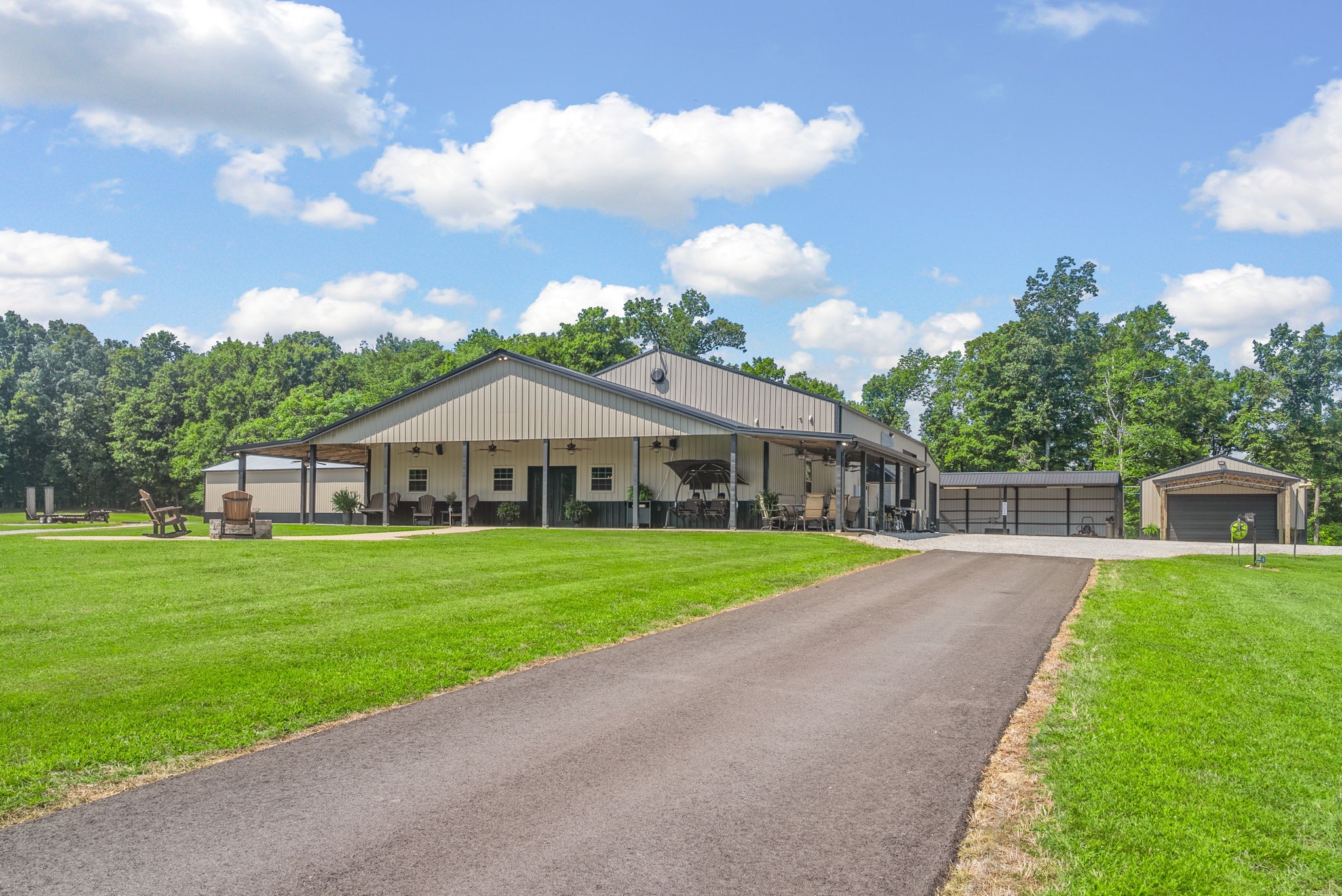 950 Choate Road Dickson, TN 37055 - Photo 3 of 56 a view of a house with a big yard and potted plants