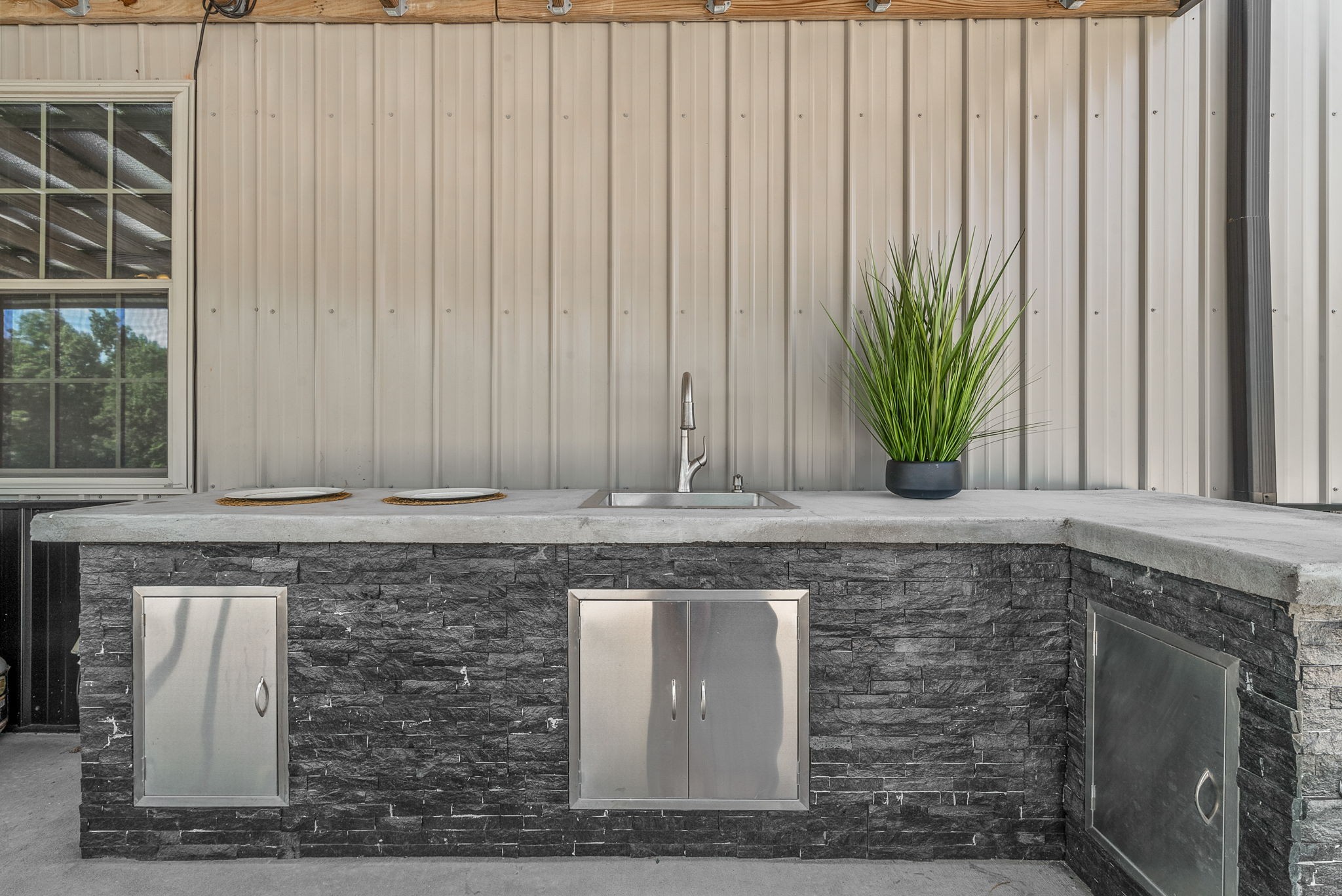 950 Choate Road Dickson, TN 37055 - Photo 41 of 56 a view of a sink a mirror and a window