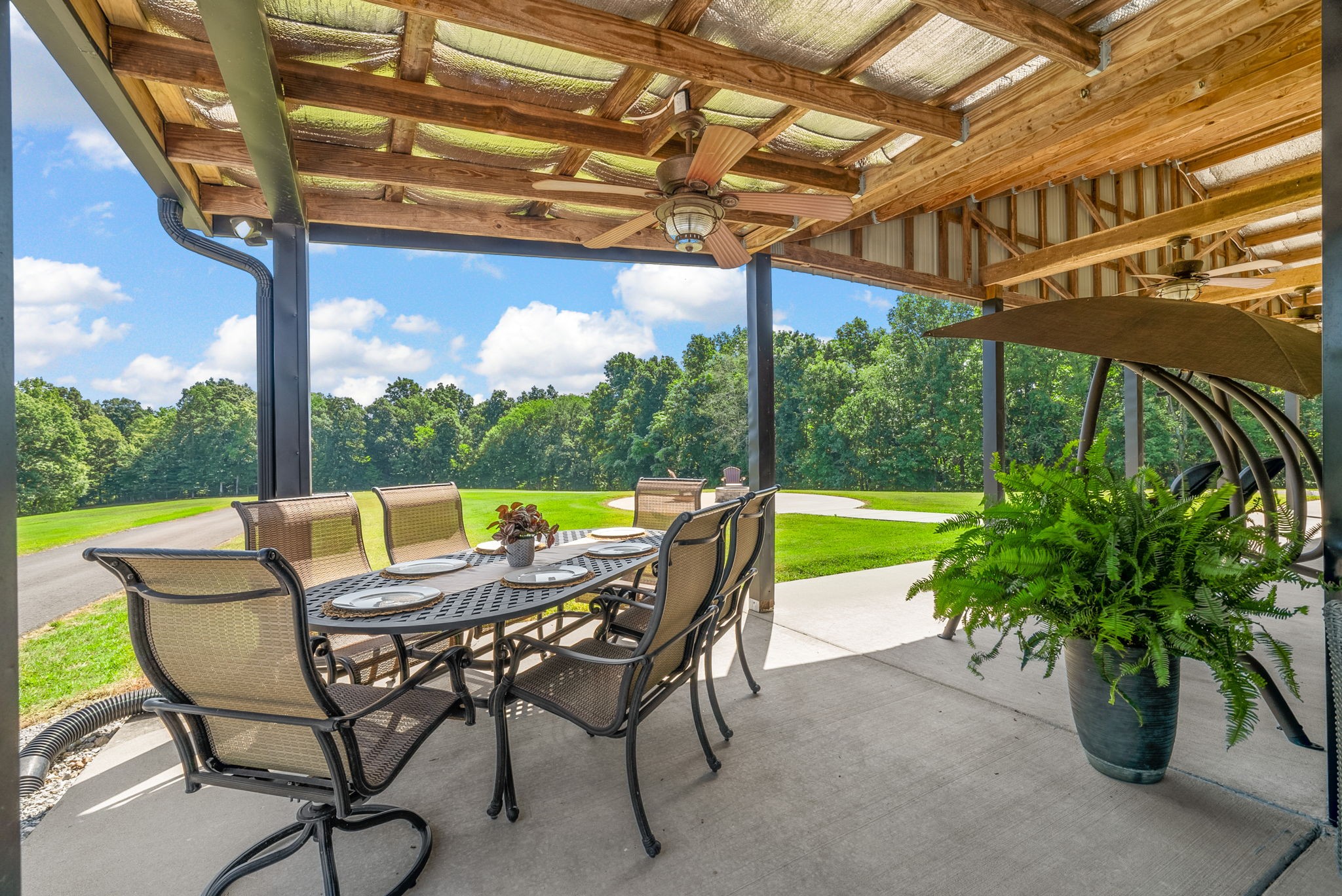 950 Choate Road Dickson, TN 37055 - Photo 43 of 56 a view of an chairs and table in the patio