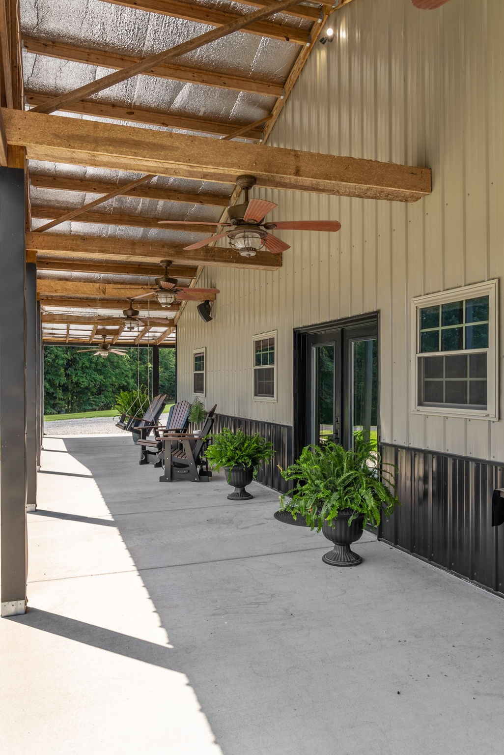 950 Choate Road Dickson, TN 37055 - Photo 44 of 56 a front view of a house with a yard and potted plants