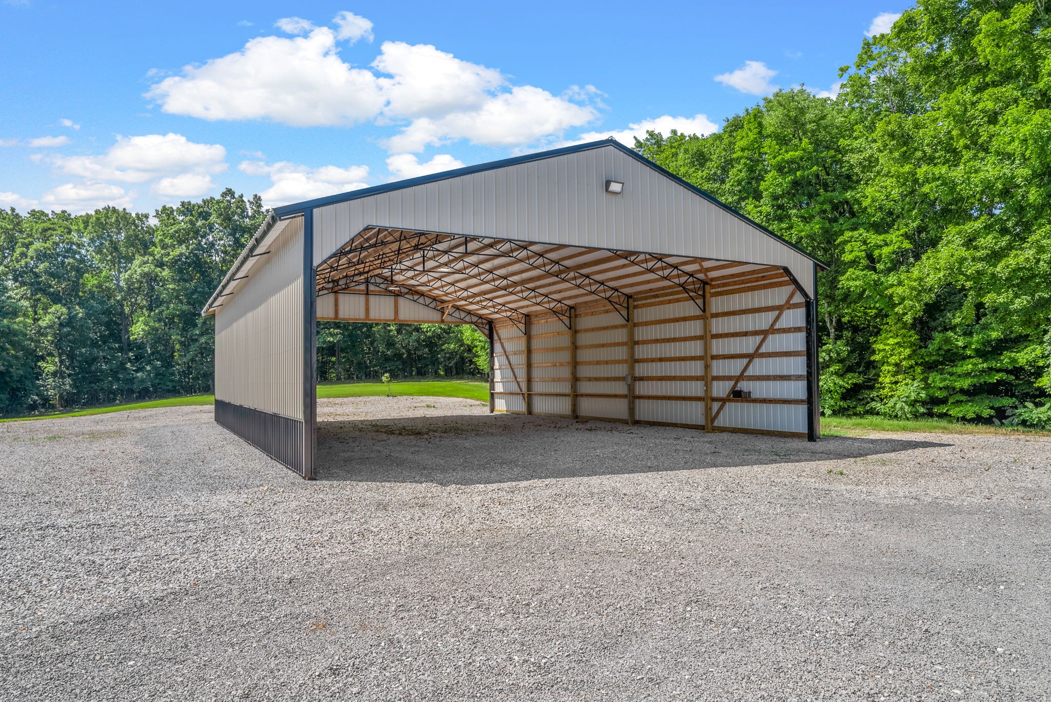 950 Choate Road Dickson, TN 37055 - Photo 46 of 56 a view of a house with a yard and garage