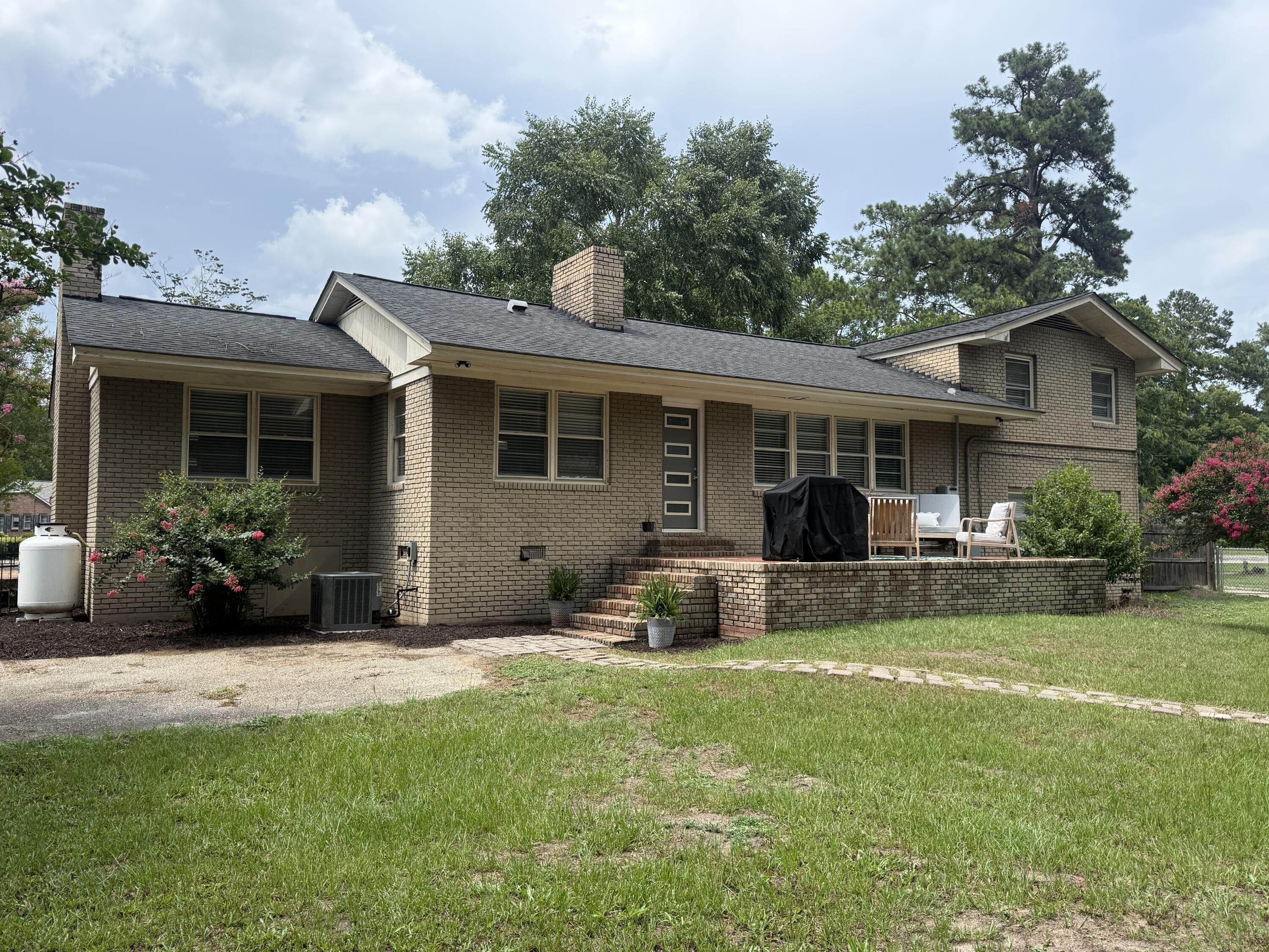 31 Riley Street Sumter, SC 29150 - Photo 12 of 65 Back view with Brick Patio