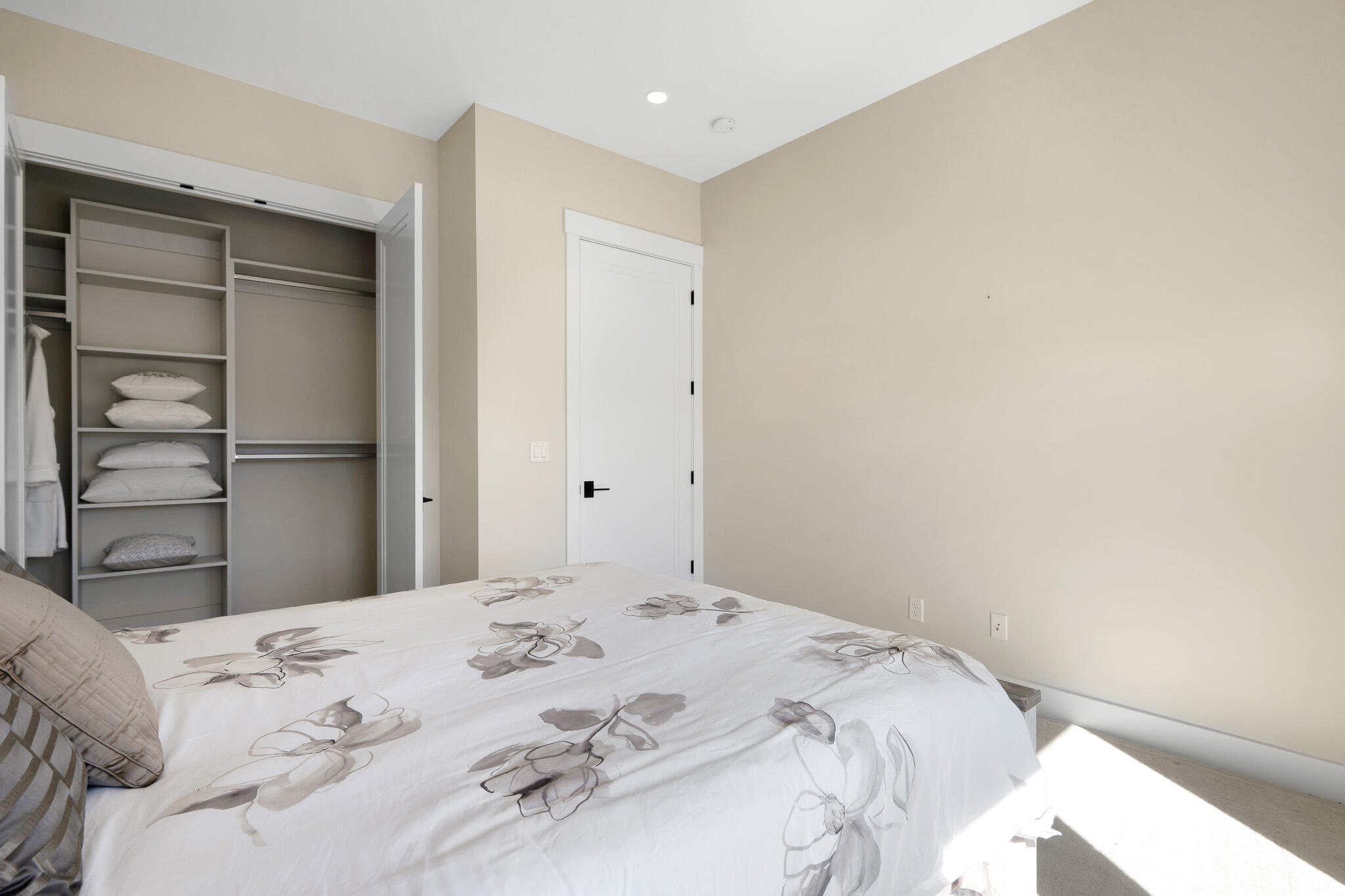 60871 River Rim Drive Bend, OR 97702 - Photo 31 of 42 a bedroom with a bed and a window
