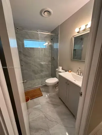 a bathroom with a sink and a toilet