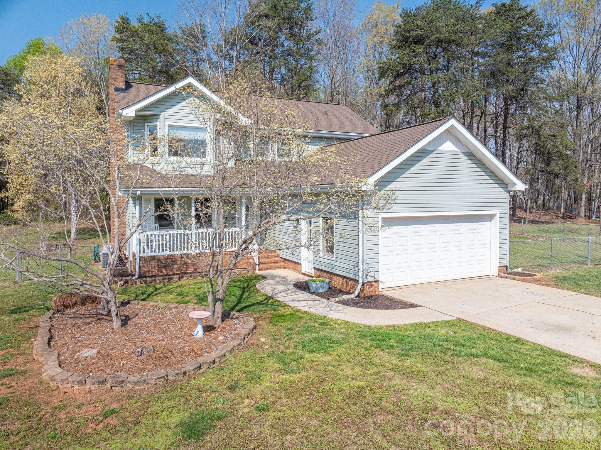 4503 Briar Creek Road Maiden, NC 28650 - Photo 1 of 48 a view of a house with yard and a garden