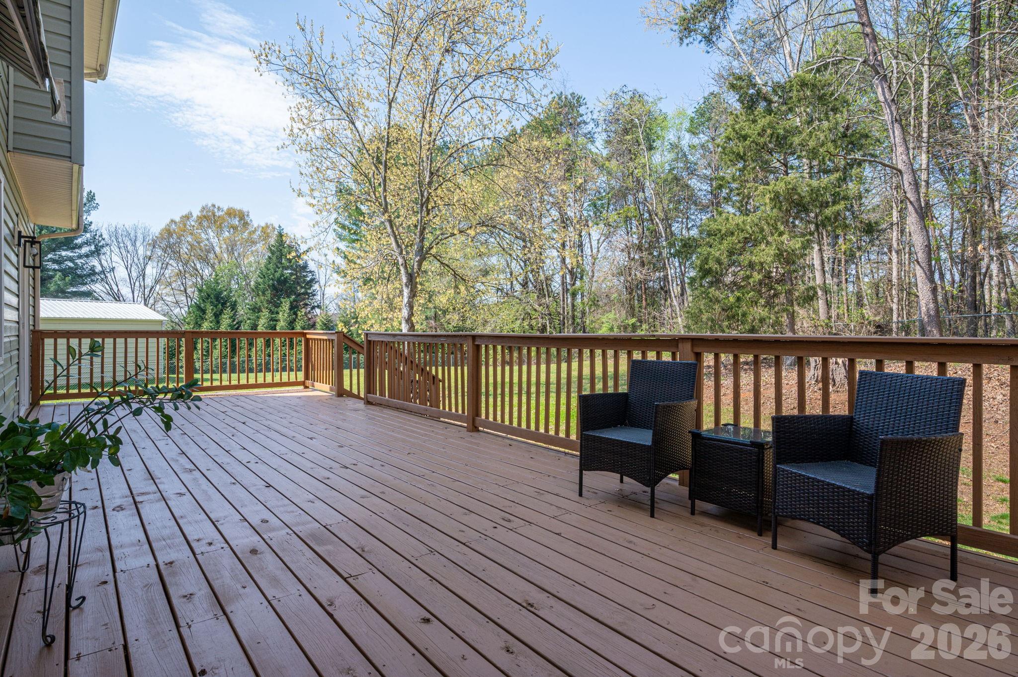 4503 Briar Creek Road Maiden, NC 28650 - Photo 38 of 48 a view of a wooden deck with furniture