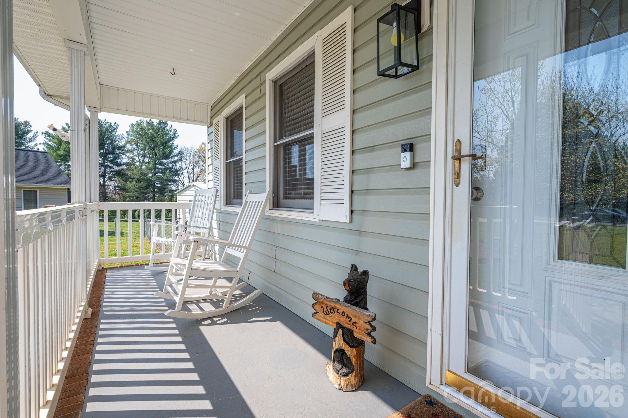 4503 Briar Creek Road Maiden, NC 28650 - Photo 4 of 48 a balcony with wooden floor and furniture