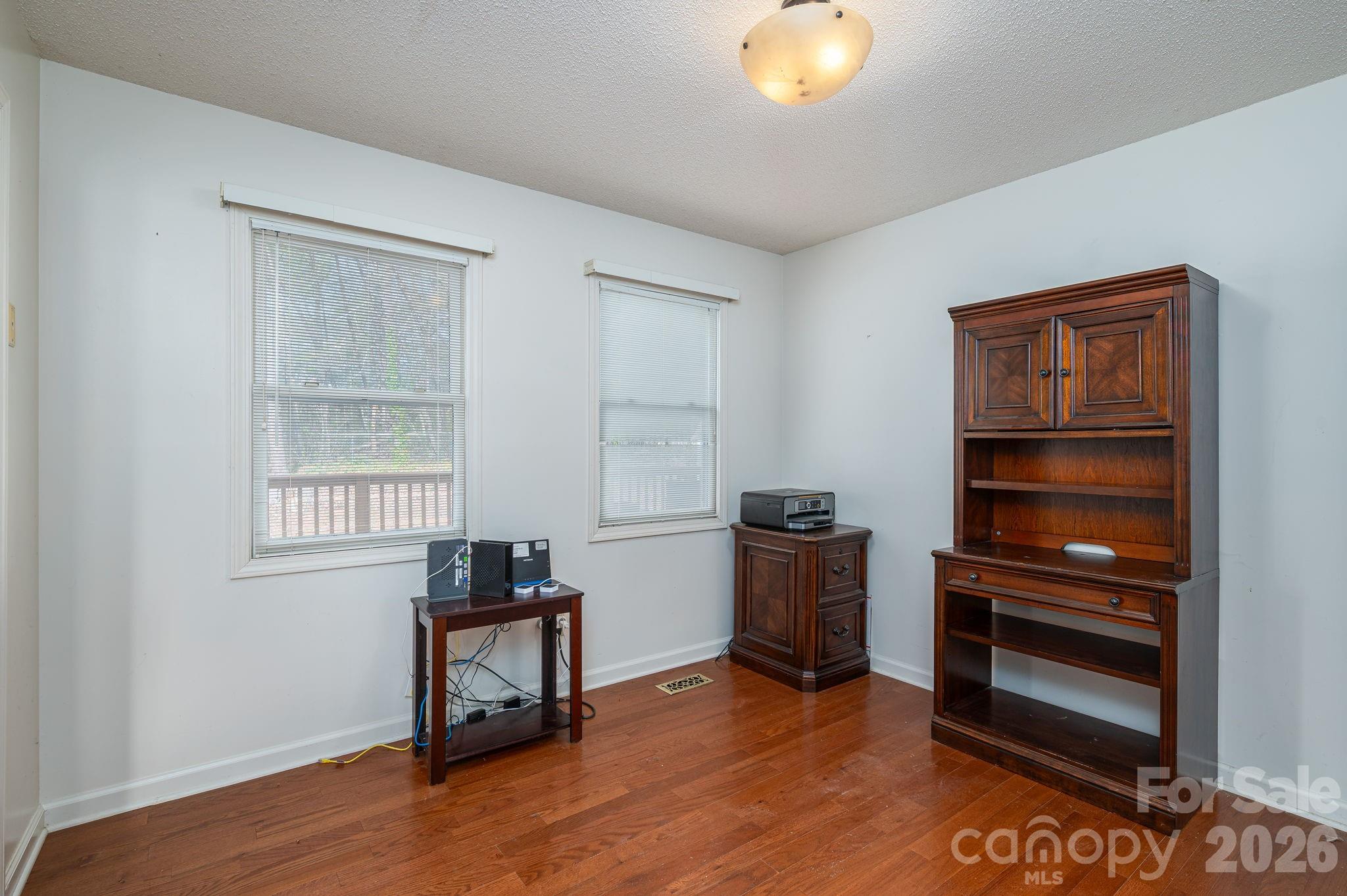 4503 Briar Creek Road Maiden, NC 28650 - Photo 10 of 48 a room with chair and a window