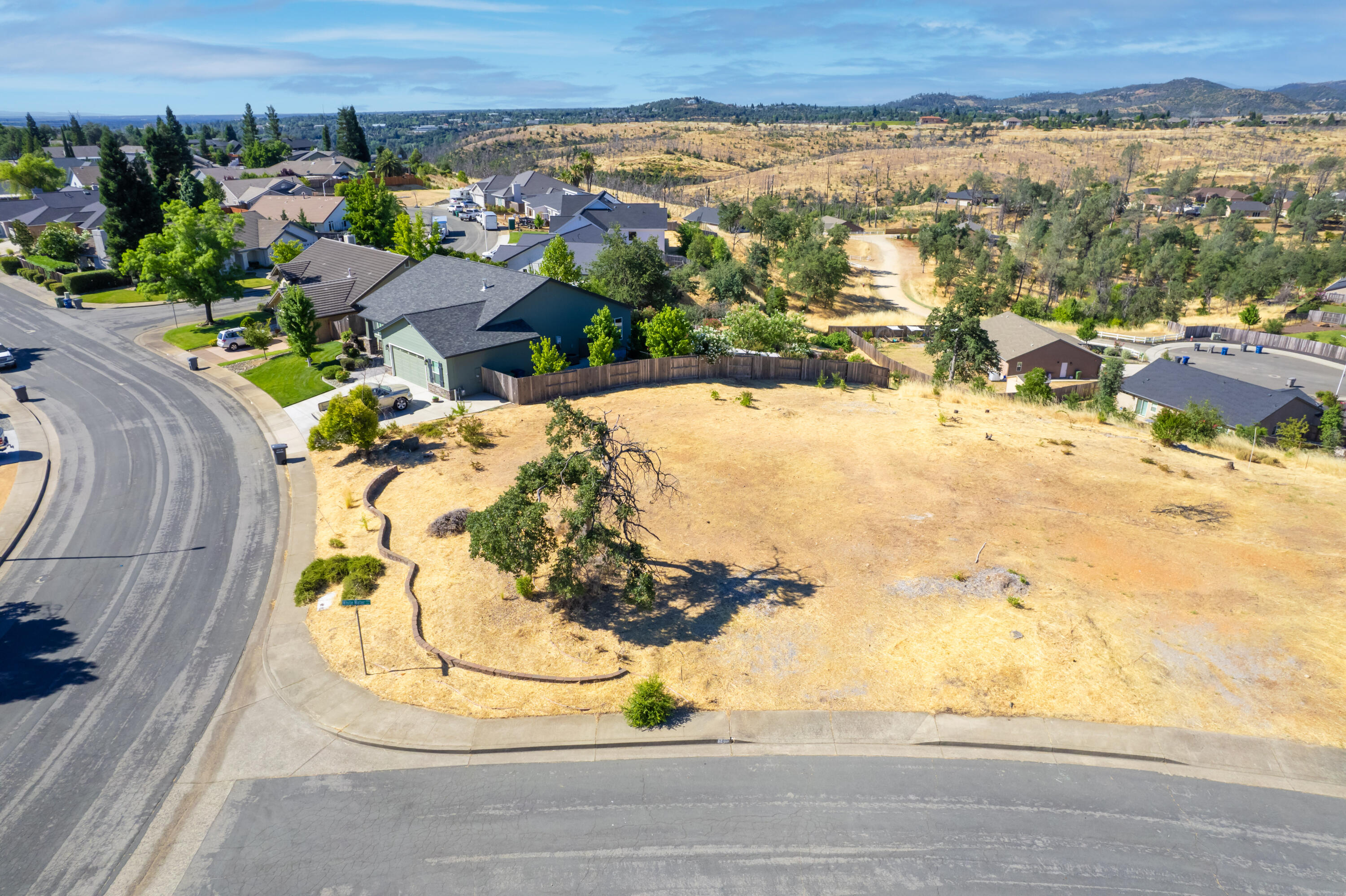 1400 White Water Circle Redding, CA 96003 - Photo 2 of 6 a view of a swimming pool