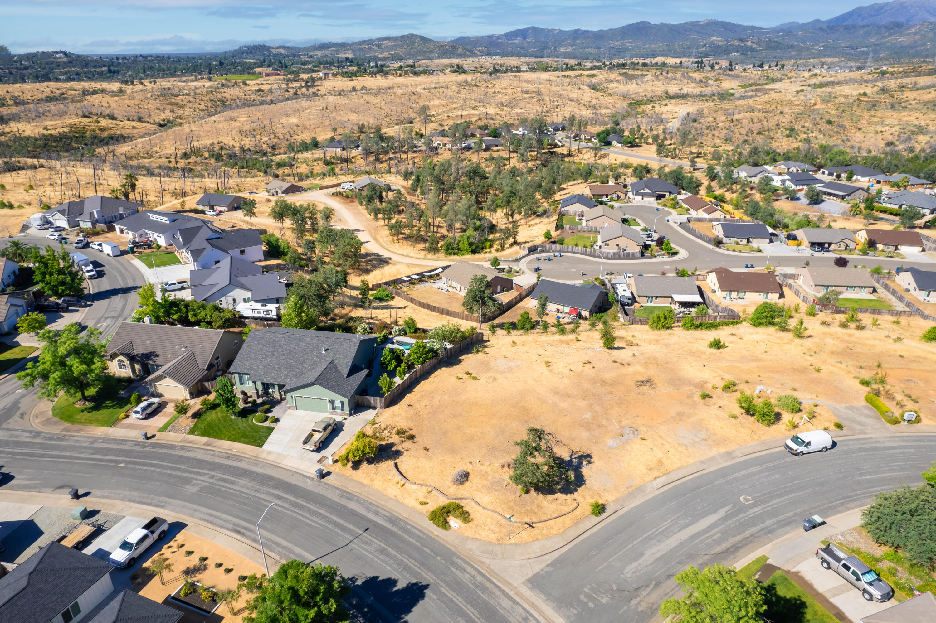 1400 White Water Circle Redding, CA 96003 - Photo 5 of 6 an aerial view of residential houses with outdoor space