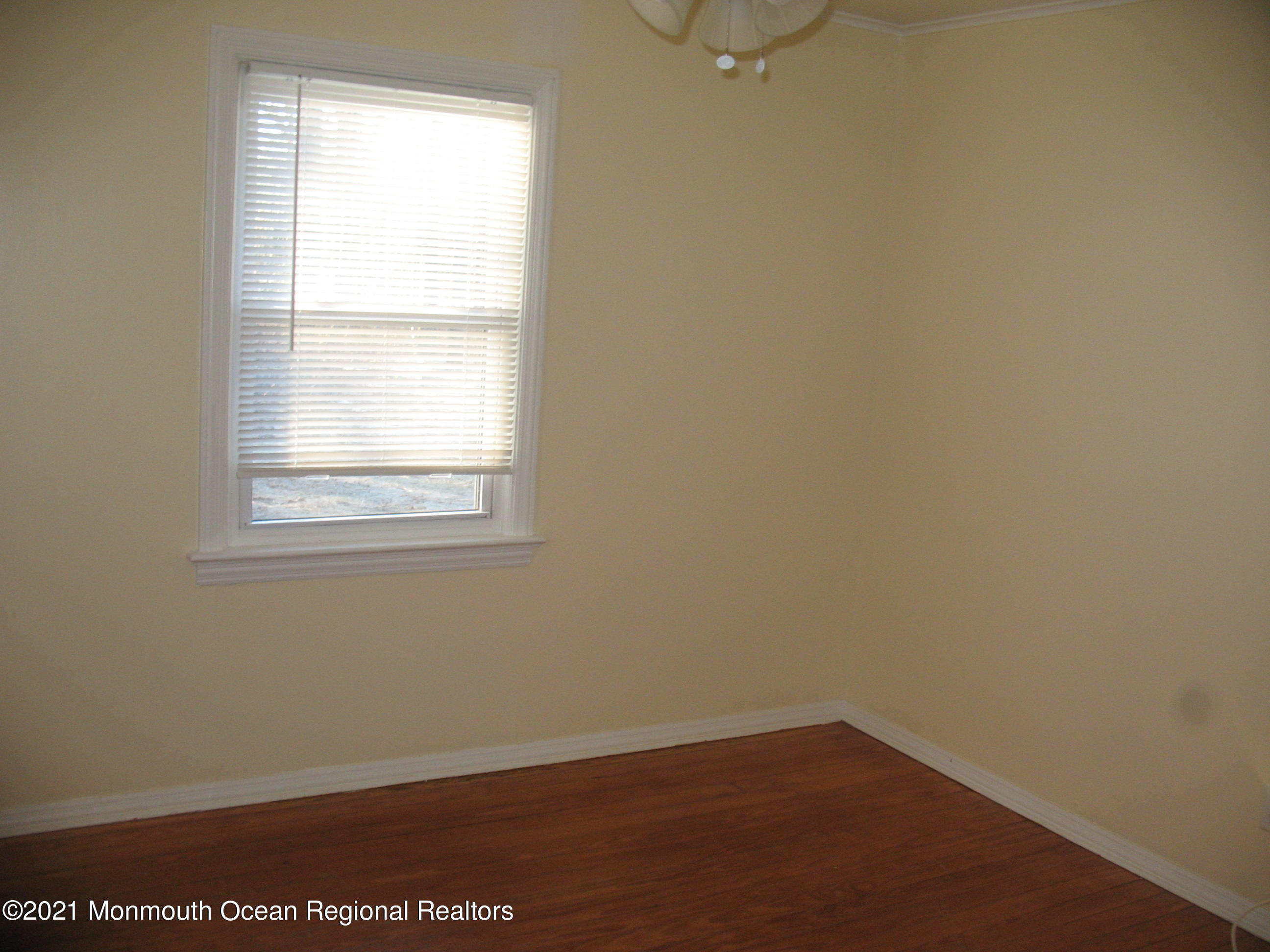 222 Windeler Road Howell, NJ 07731 - Photo 11 of 17 an empty room with a window