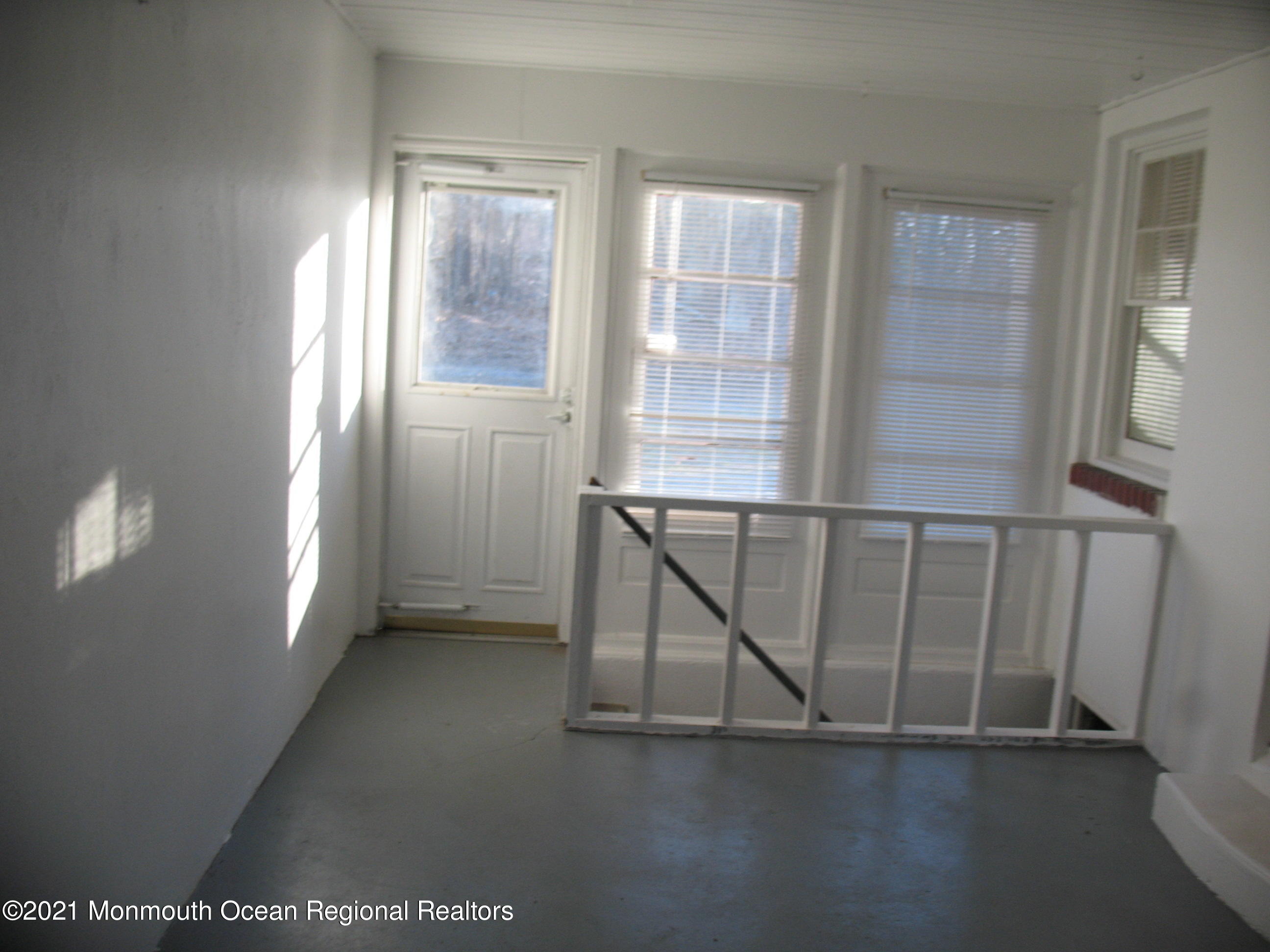 222 Windeler Road Howell, NJ 07731 - Photo 15 of 17 an empty room with windows