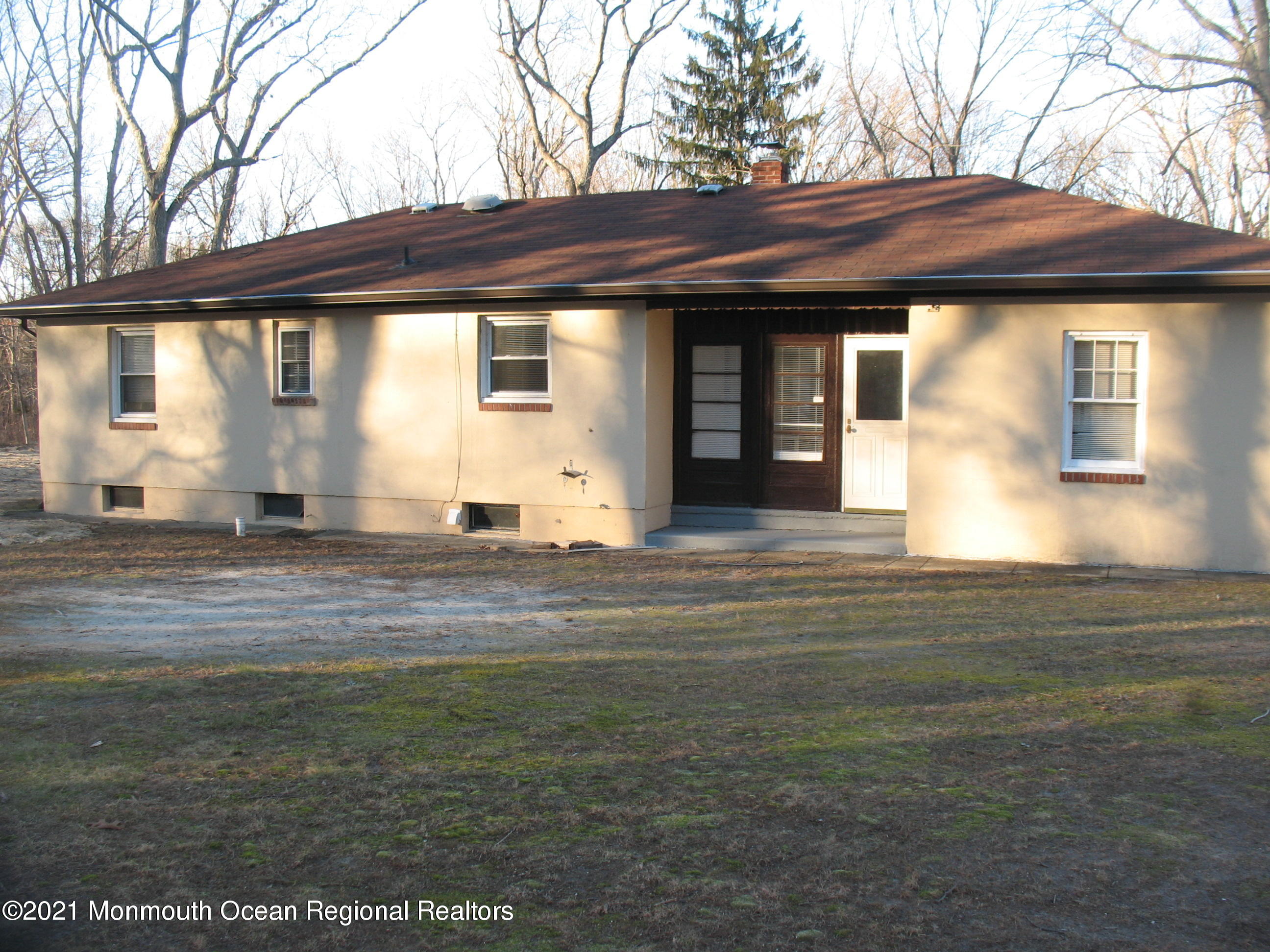 222 Windeler Road Howell, NJ 07731 - Photo 17 of 17 a front view of a house with a garden
