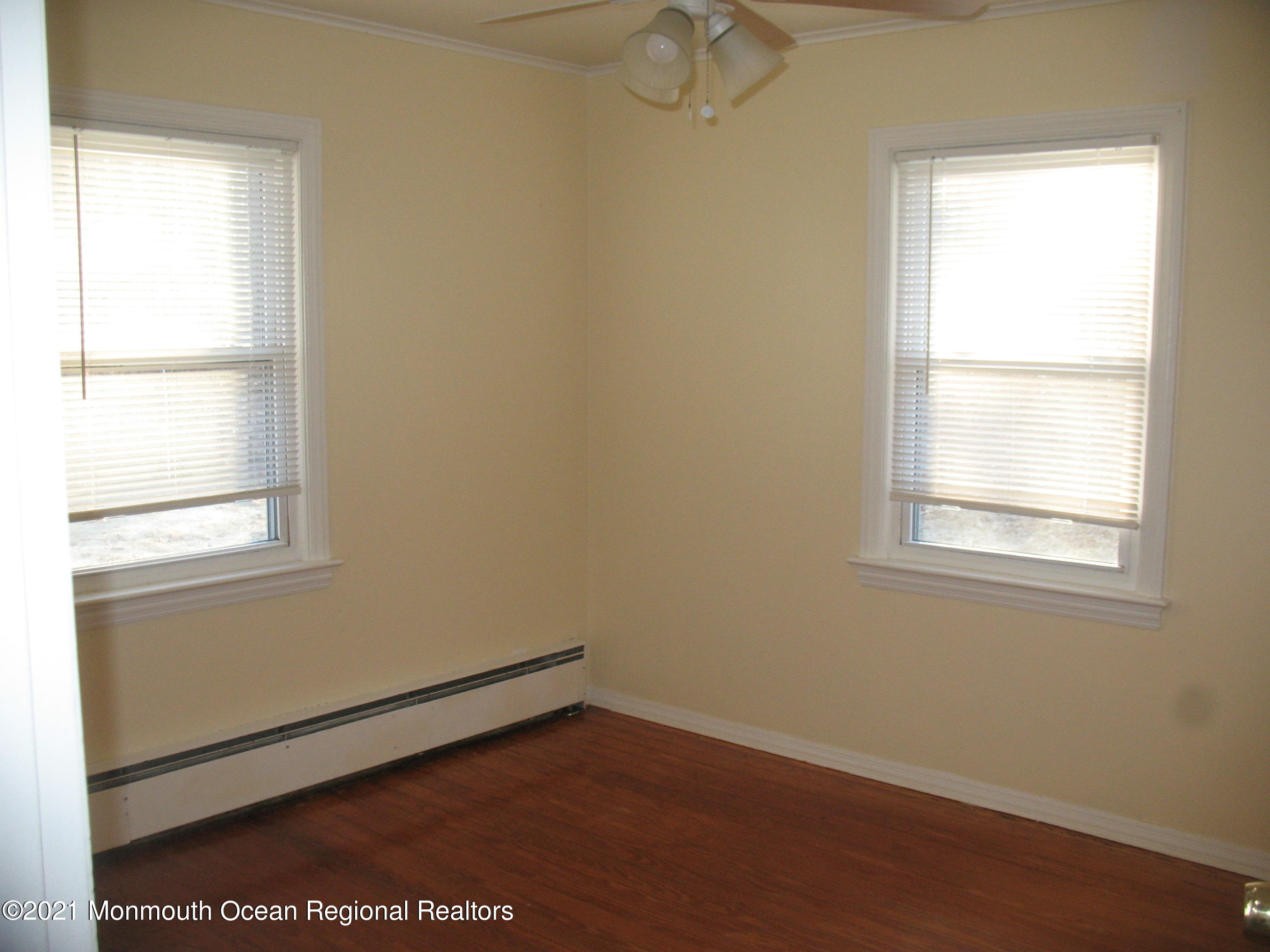 222 Windeler Road Howell, NJ 07731 - Photo 10 of 17 an empty room with a window