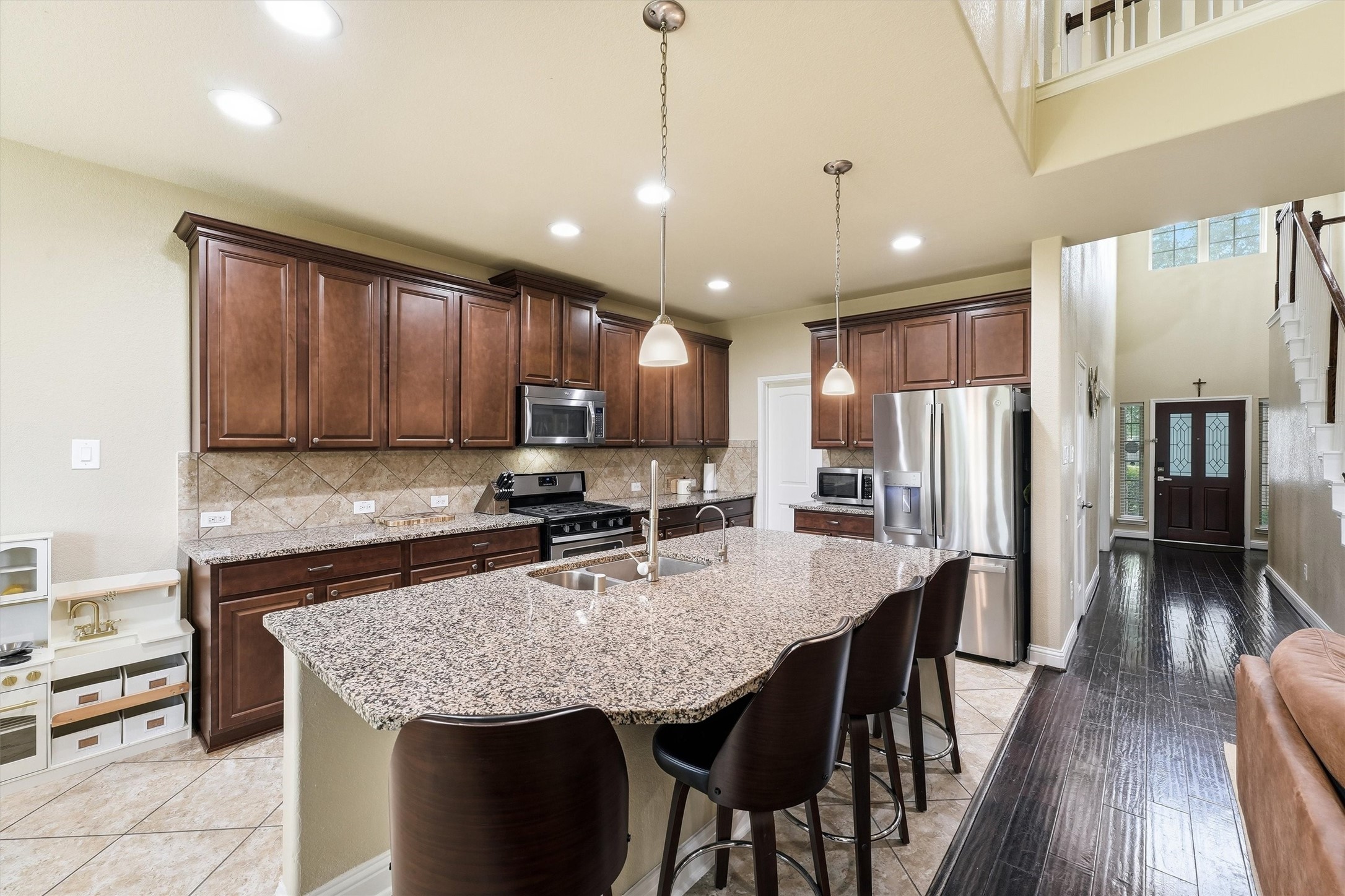 1908 Sunset Terrace Lane Pearland, TX 77089 - Photo 8 of 35 Kitchen overlooking the family room.