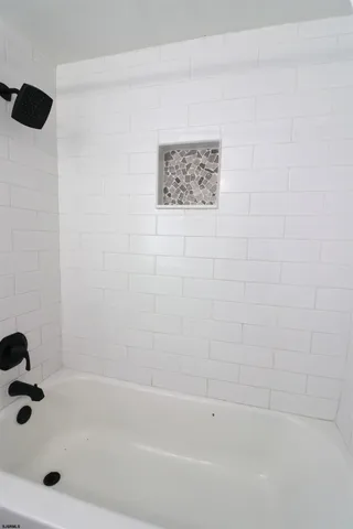 a bathroom with a bathtub