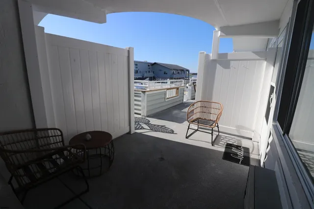 a view of a chair and table in a kitchen