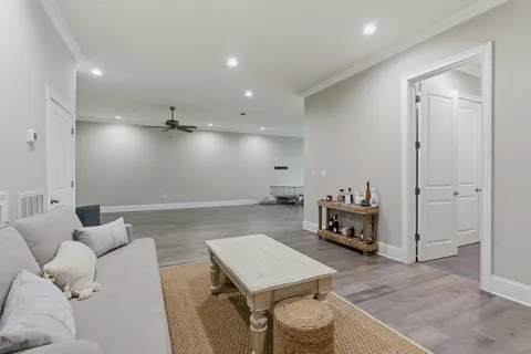 a living room with furniture and a table