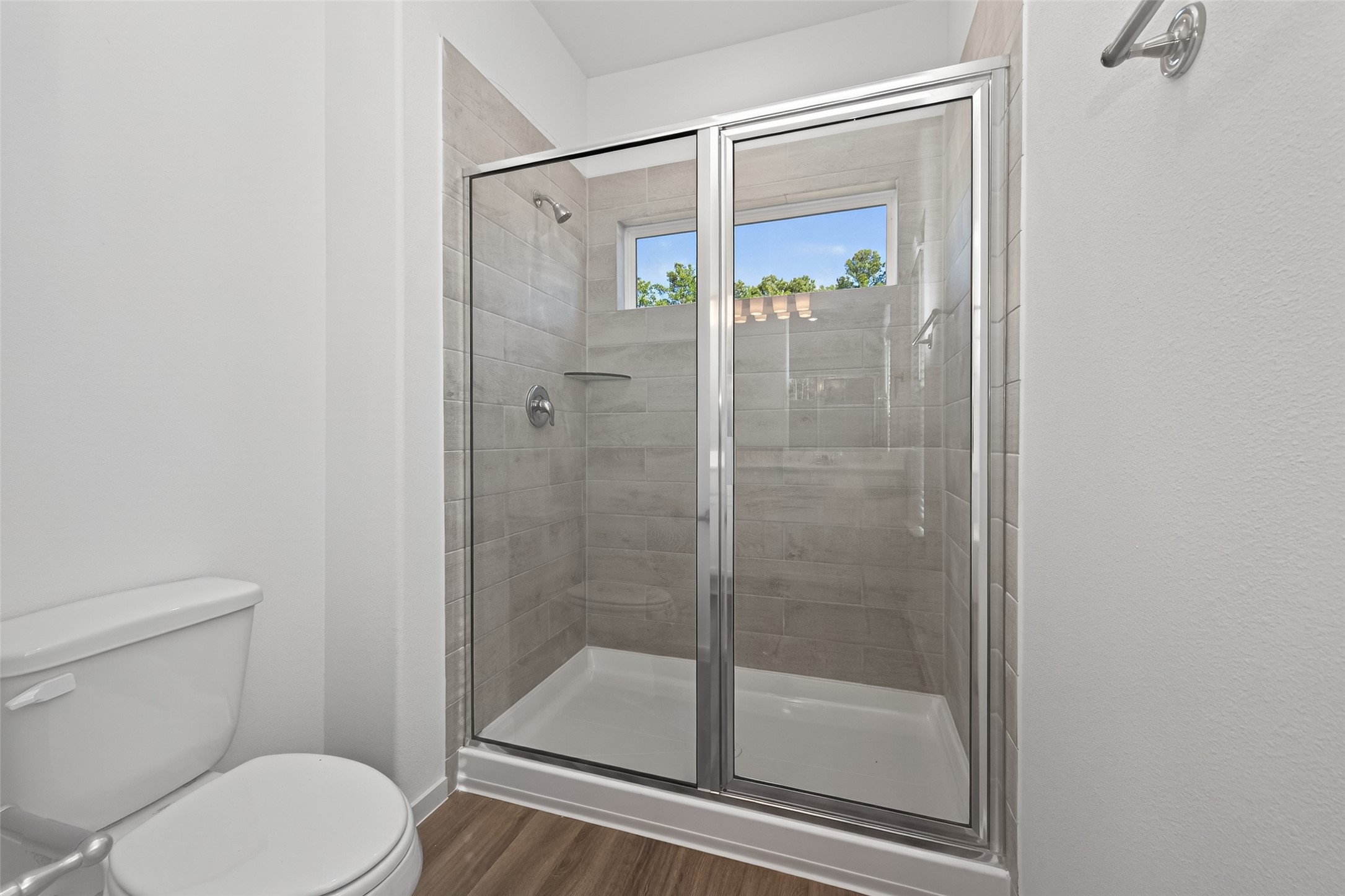 9718 Enclave Ridge Road Willis, TX 77318 - Photo 28 of 34 a bathroom with a shower a toilet and a shower