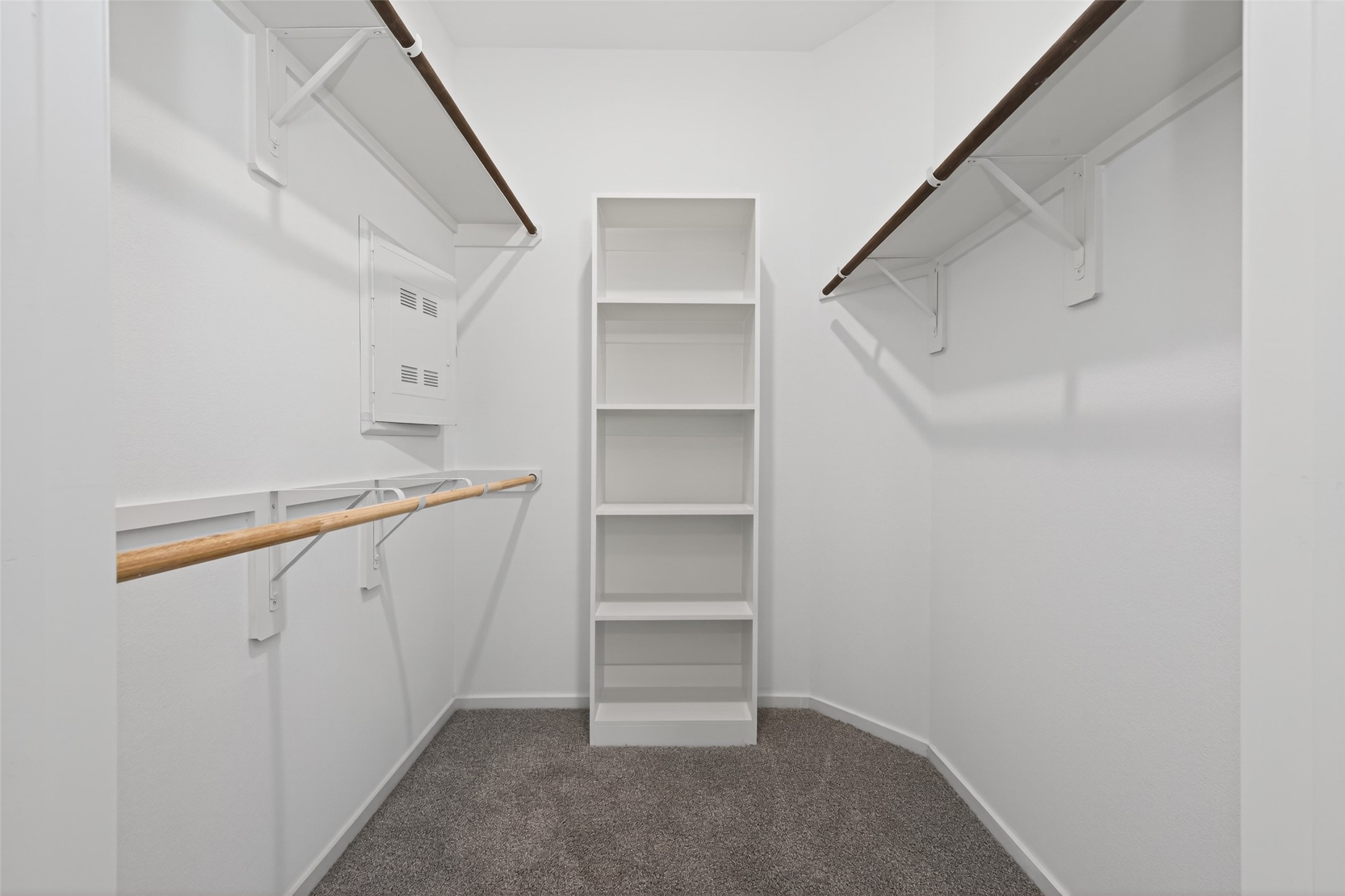 9718 Enclave Ridge Road Willis, TX 77318 - Photo 29 of 34 a view of an empty walk in closet