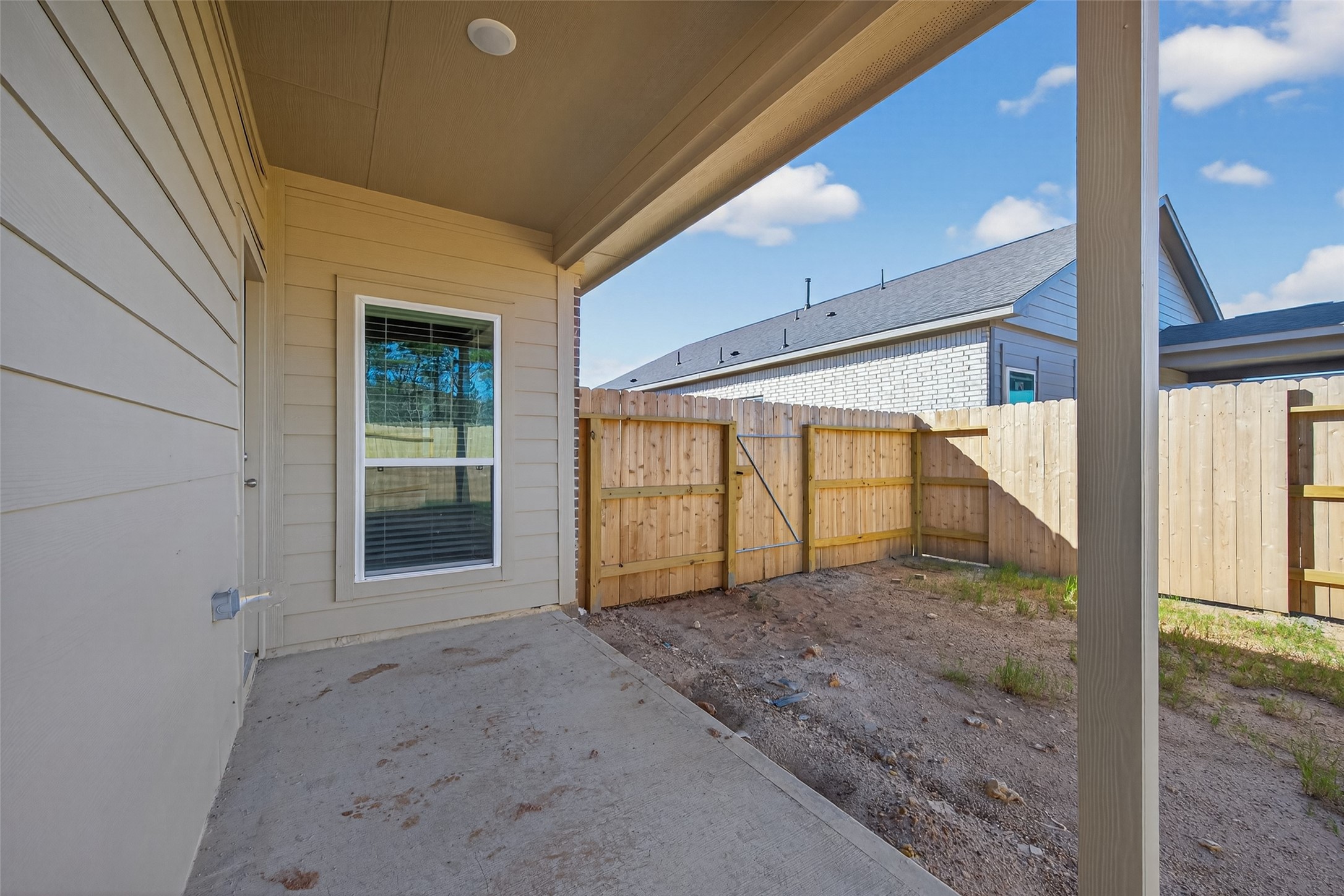9718 Enclave Ridge Road Willis, TX 77318 - Photo 34 of 34 a view of porch with green space