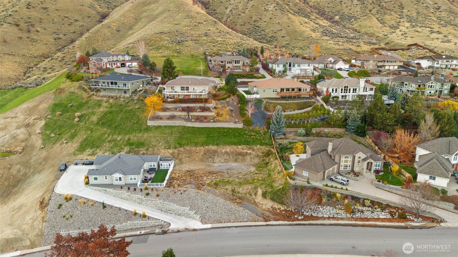 756 Castle Heights Drive Wenatchee, WA 98801 - Photo 1 of 22 an aerial view of residential houses with outdoor space