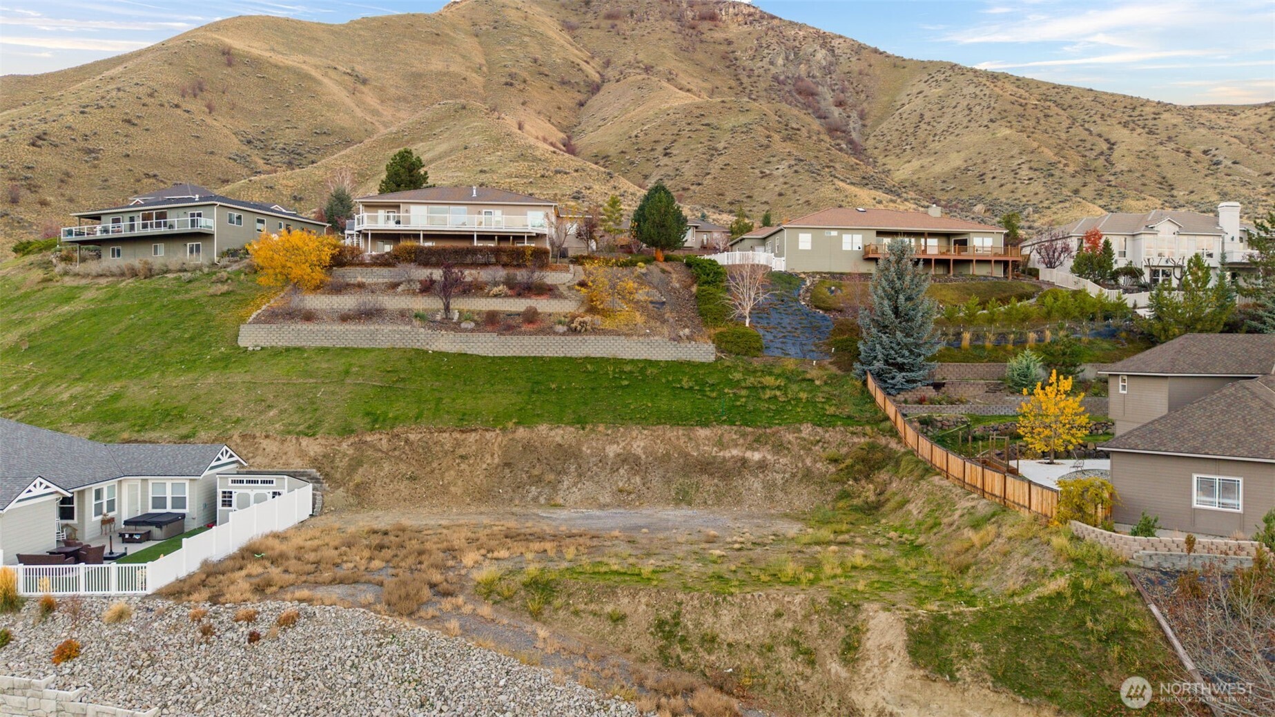 756 Castle Heights Drive Wenatchee, WA 98801 - Photo 15 of 22 a view of a town with mountains in the background