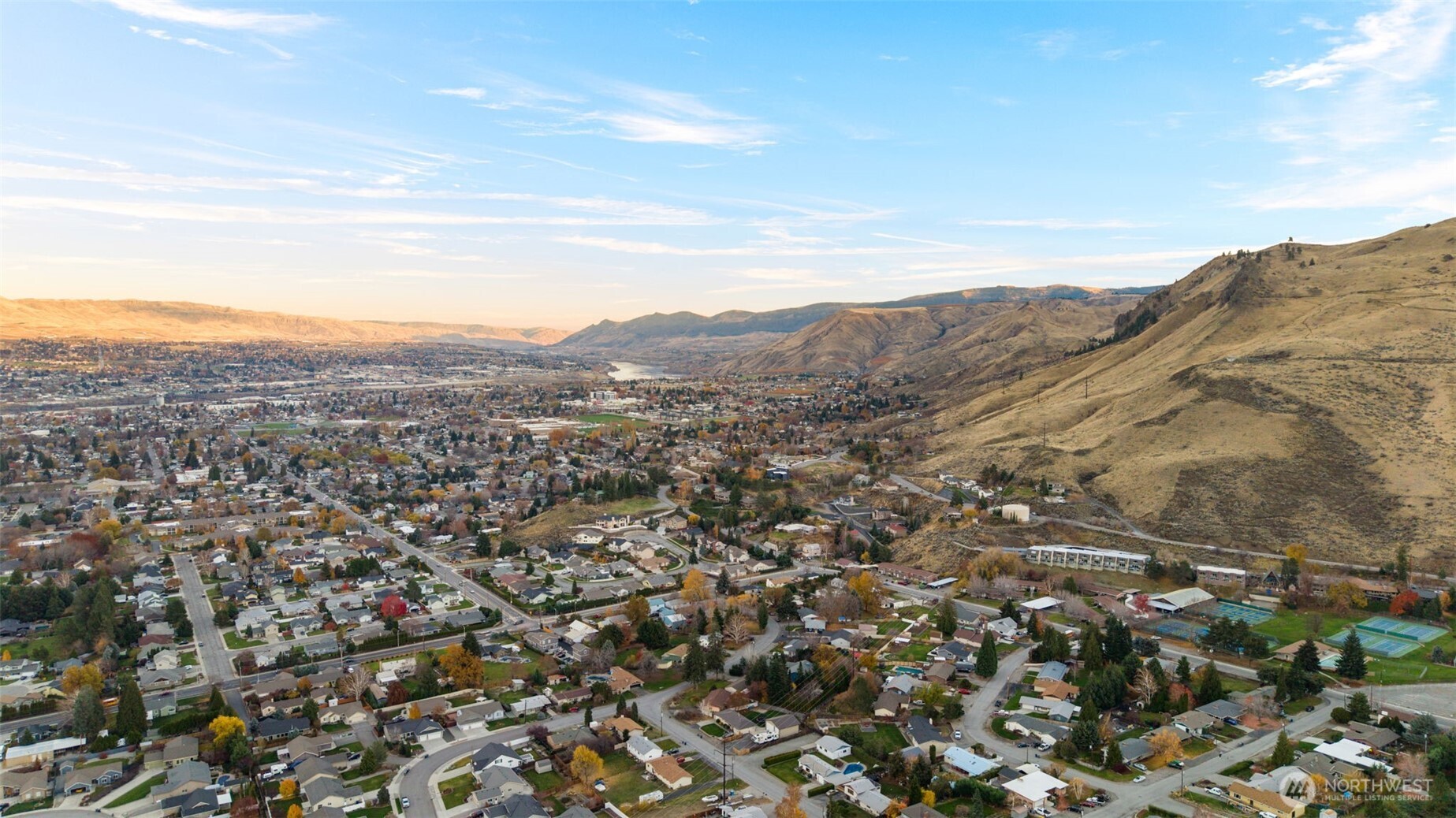 756 Castle Heights Drive Wenatchee, WA 98801 - Photo 21 of 22 an aerial view of houses covered in trees