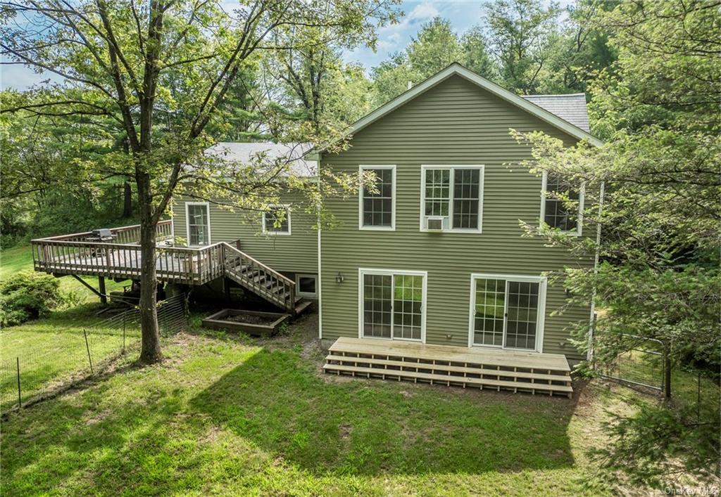 7 South Shanks Road Clinton Corners, NY 12514 - Photo 30 of 35 Back of house with a wooden deck and a yard