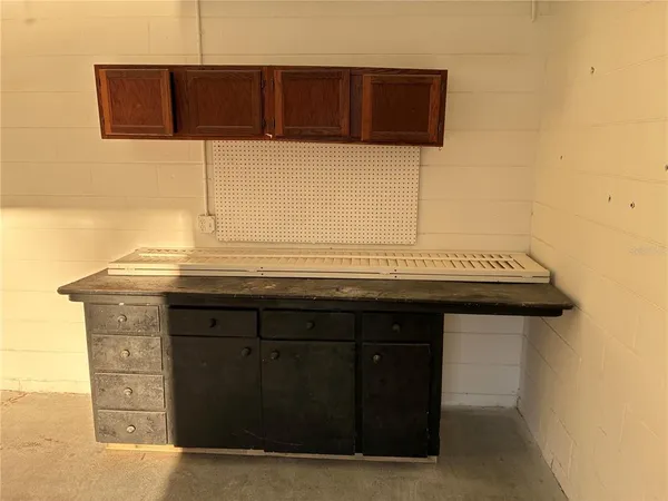 a view of a hardwood floor and a sink
