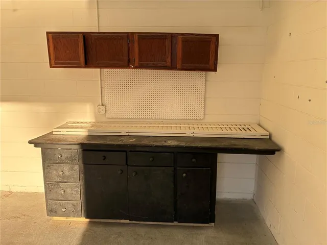 a view of a hardwood floor and a sink