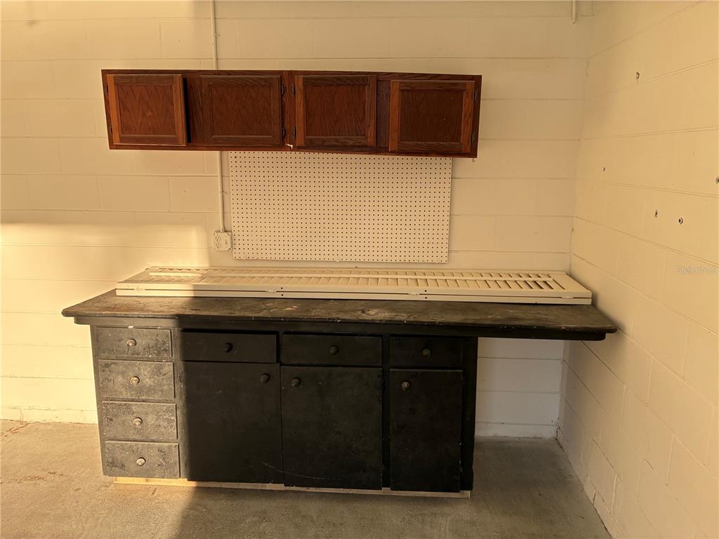 41515 Silver Drive Umatilla, FL 32784 - Photo 22 of 29 a bathroom with a sink and a mirror