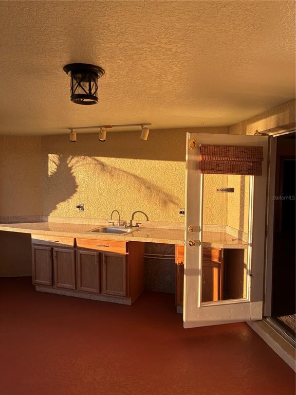 41515 Silver Drive Umatilla, FL 32784 - Photo 23 of 29 a view of a hardwood floor and a sink