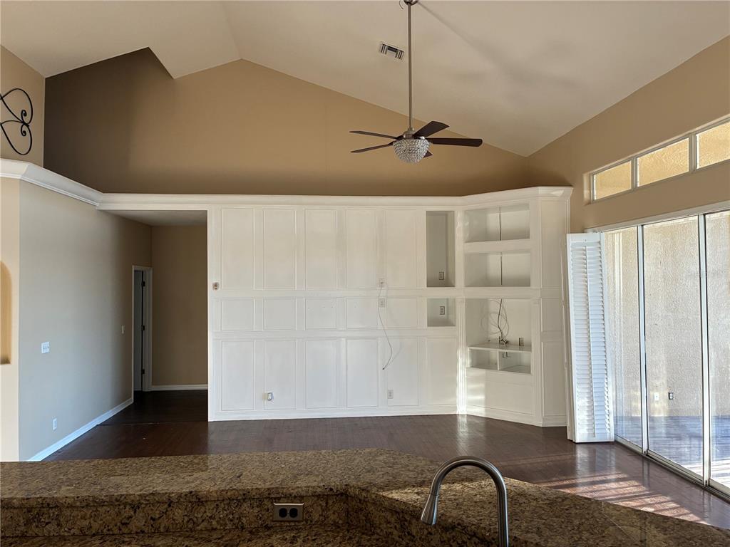 41515 Silver Drive Umatilla, FL 32784 - Photo 7 of 29 a view of a livingroom with a staircase